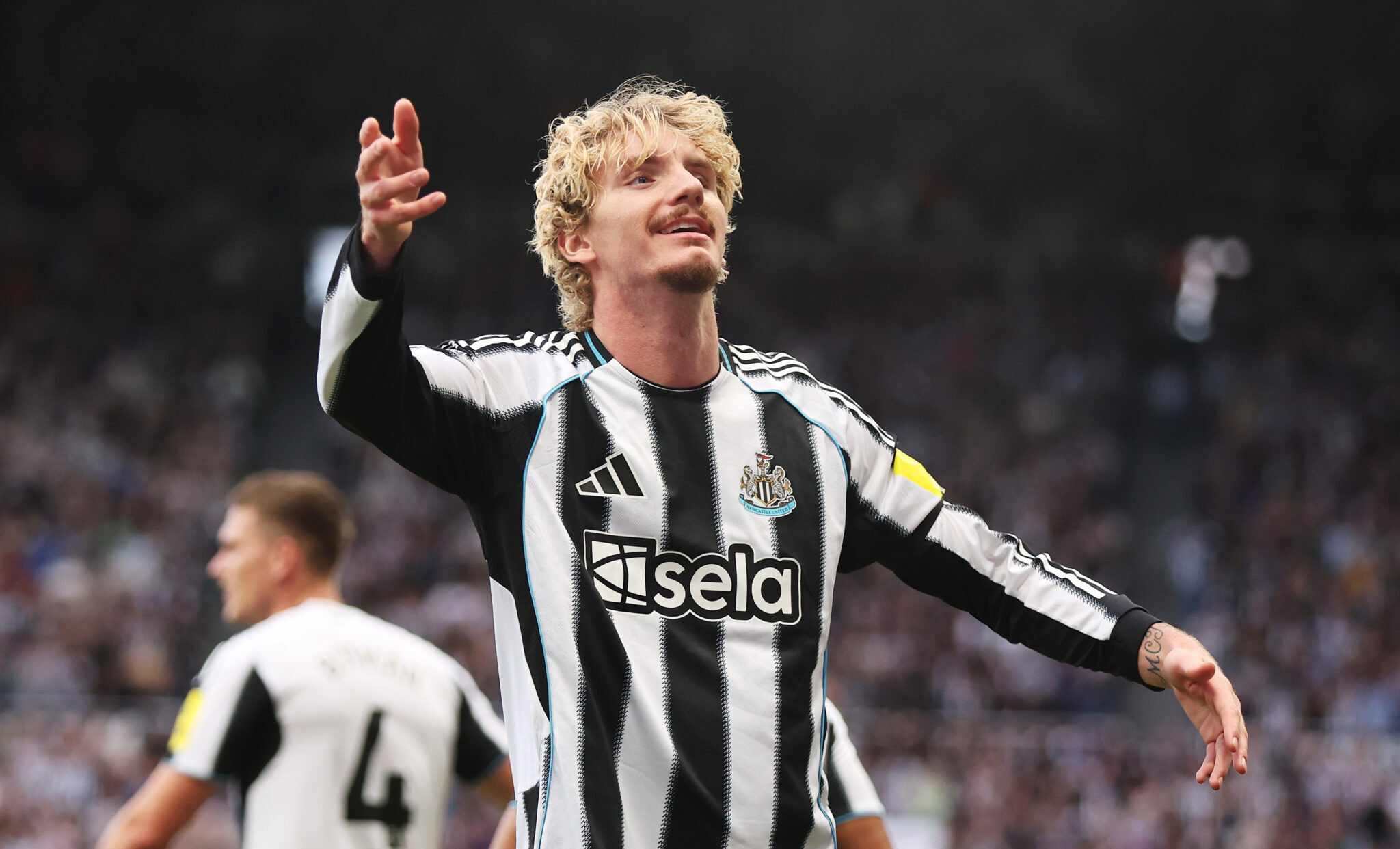 Newcastle United striker Nick Woltemade celebrates a goal.