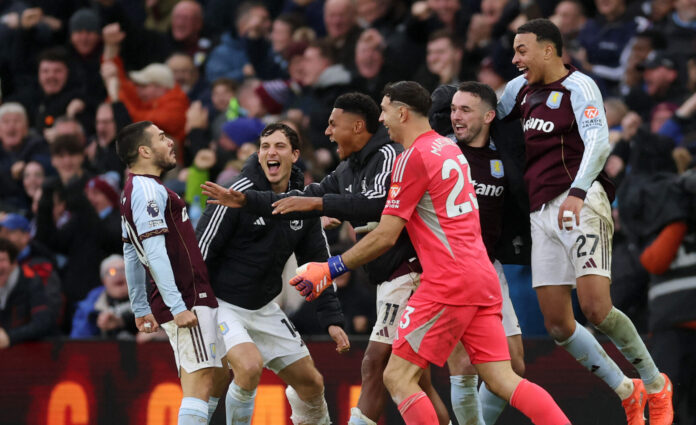 Emi Buendia of Aston Villa (L) celebrates scoring his team's second goal with teammates during the Premier League match between Aston Villa and Arsenal at Villa Park on December 06, 2025 in Birmingham, England.