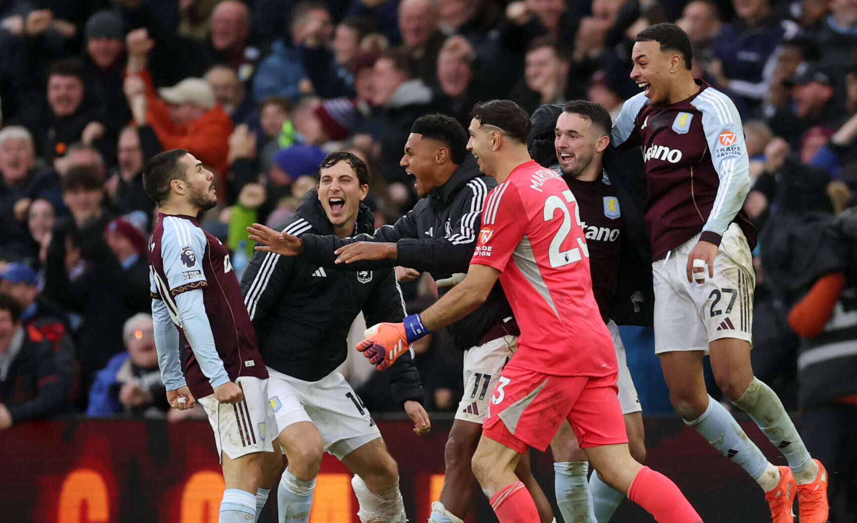 Emi Buendia of Aston Villa (L) celebrates scoring his team's second goal with teammates during the Premier League match between Aston Villa and Arsenal at Villa Park on December 06, 2025 in Birmingham, England.