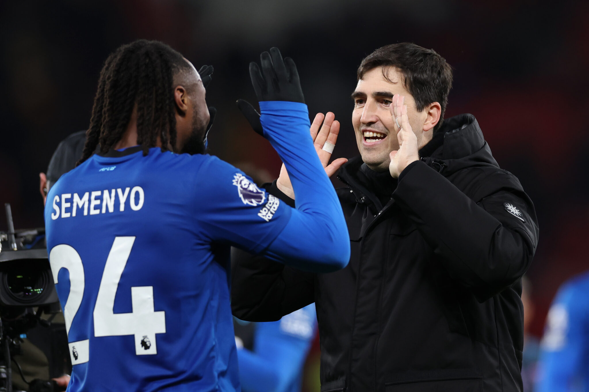 Andoni Iraola, Manager of AFC Bournemouth, interacts with Antoine Semenyo of AFC Bournemouth at the end of the Premier League match between Manchester United and Bournemouth at Old Trafford on December 15, 2025 in Manchester, England.