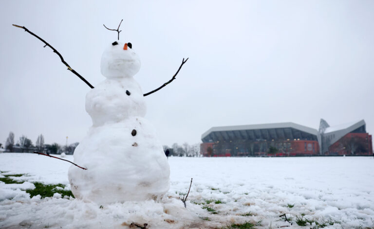 A general view outside the stadium as a snowman is seen following heavy snowfall prior to the Premier League match between Liverpool FC and Manchester United FC at Anfield on January 05, 2025 in Liverpool, England.