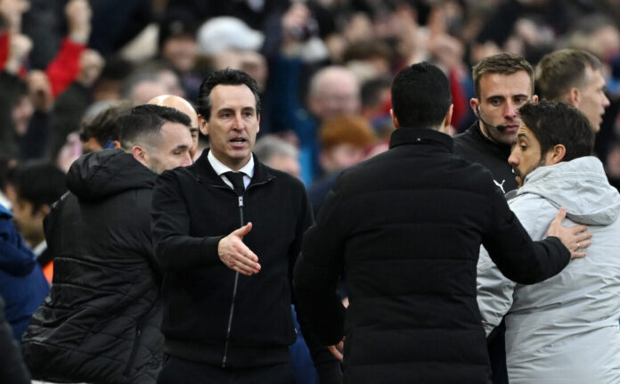 Unai Emery, Manager of Aston Villa, walks over to Mikel Arteta, Manager of Arsenal, to shake hands at the end of the game during the Premier League match between Aston Villa and Arsenal at Villa Park on December 06, 2025 in Birmingham, England.
