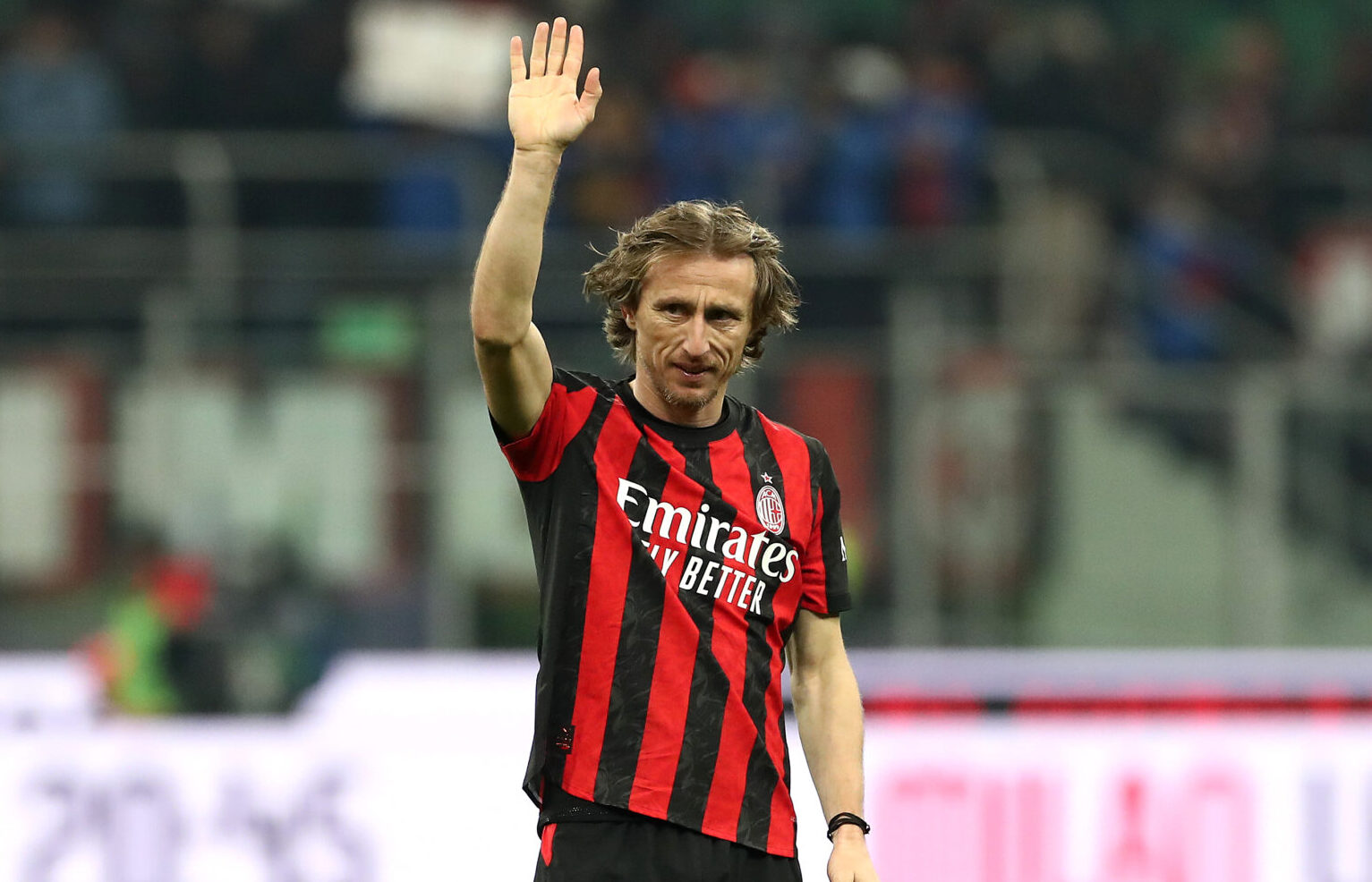 AC Milan player Luka Modric waves to the fans.