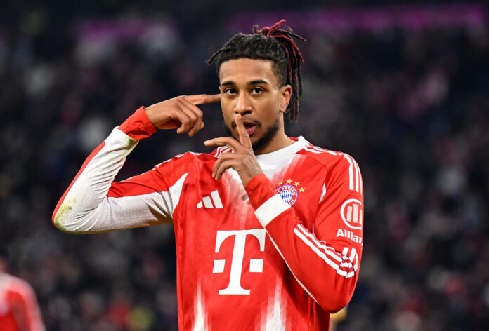 Bayern Munich player Michael Olise celebrates a goal.