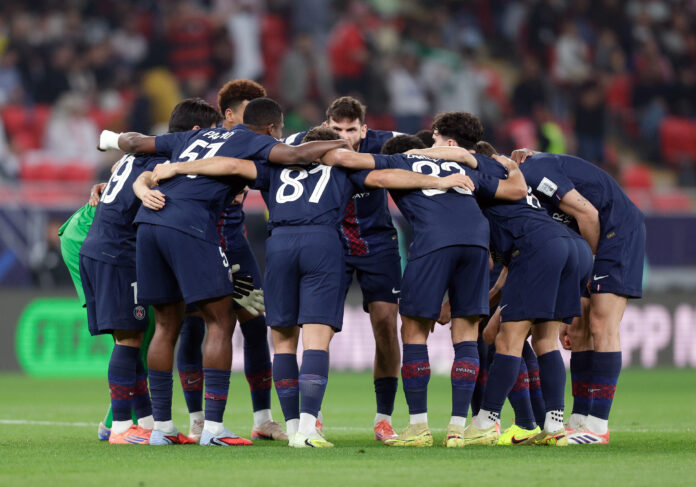 PSG players form a huddle.