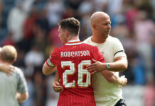 Arne Slot drops Liverpool transfer hint ahead of summer window Arne Slot, Manager of Liverpool, hugs Andy Robertson after the pre-season friendly match between Preston North End and Liverpool at Deepdale on July 13, 2025 in Preston, England.
