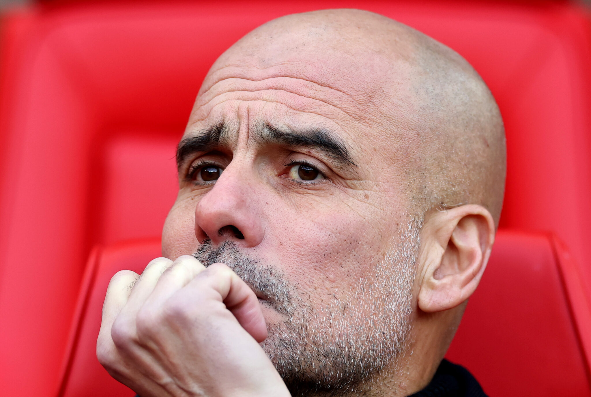 Pep Guardiola looks on during the Premier League match between Man Utd and Man City at Old Trafford on January 17, 2026 in Manchester, England.