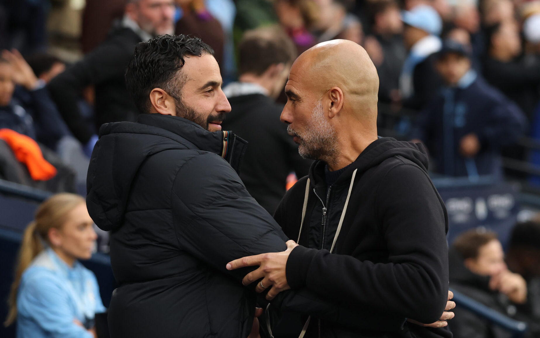 Ruben Amorim, Manager of Man Utd, embraces Pep Guardiola, Manager of Man City, prior to the Premier League match between Manchester City and Manchester United at Etihad Stadium on September 14, 2025 in Manchester, England.