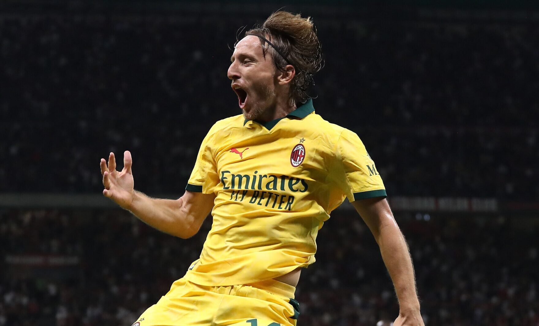 Luka Modric of AC Milan celebrates after scoring their team's first goal during the Serie A match between AC Milan and Bologna FC 1909 at Giuseppe Meazza Stadium on September 14, 2025 in Milan, Italy.