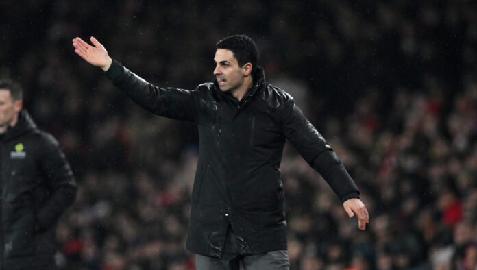 Mikel Arteta, Manager of Arsenal, reacts during the Carabao Cup Semi Final Second Leg match between Arsenal and Chelsea at Emirates Stadium on February 03, 2026 in London, England.