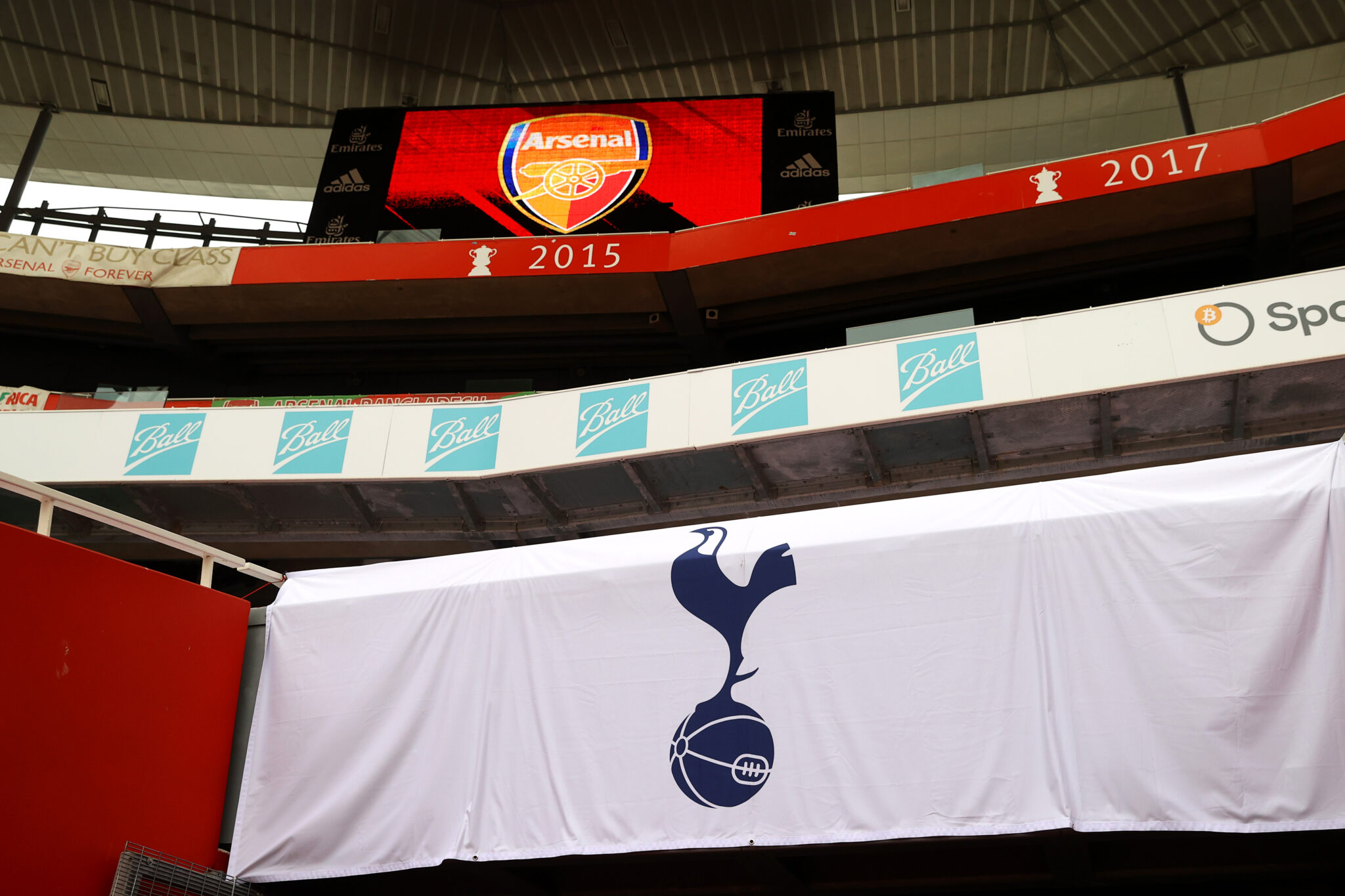 A Spurs flag is seen inside the stadium prior to the Premier League match between Arsenal and Tottenham Hotspur at Emirates Stadium on March 14, 2021 in London, England. Sporting stadiums around the UK remain under strict restrictions due to the Coronavirus Pandemic as Government social distancing laws prohibit fans inside venues resulting in games being played behind closed doors.