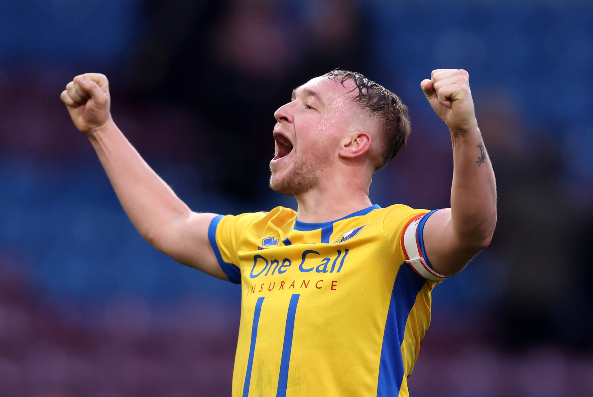 Louis Reed of Mansfield Town celebrates victory following the Emirates FA Cup Fourth Round match between Burnley and Mansfield Town at Turf Moor on February 14, 2026 in Burnley, England.