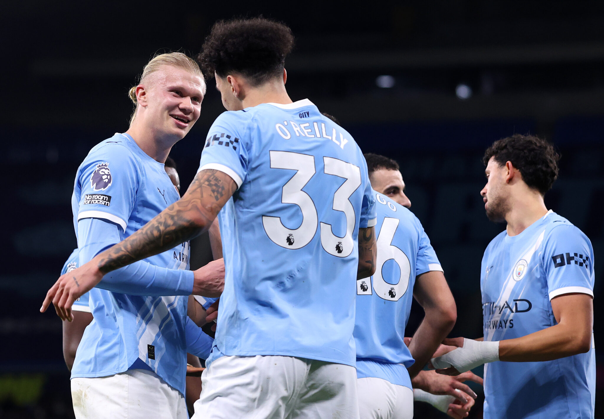 Nico O'Reilly of Man City celebrates scoring his team's second goal with teammate Erling Haaland during the Premier League match between Manchester City and Newcastle United at Etihad Stadium on February 21, 2026 in Manchester, England.