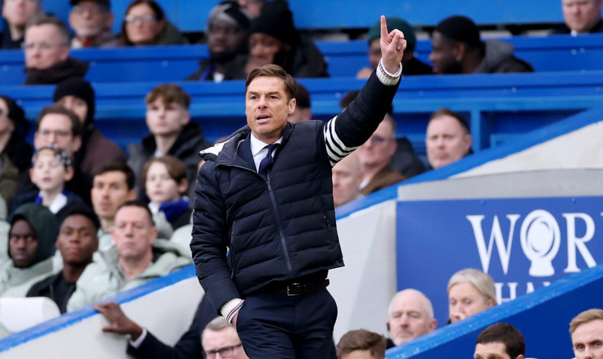Scott Parker, Manager of Burnley, gives instructions during the Premier League match between Chelsea and Burnley at Stamford Bridge on February 21, 2026 in London, England.