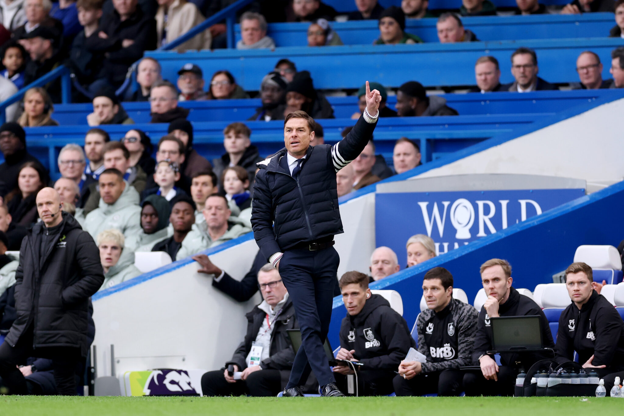 Scott Parker, Manager of Burnley, gives instructions during the Premier League match between Chelsea and Burnley at Stamford Bridge on February 21, 2026 in London, England.