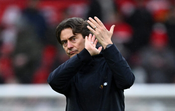 Thomas Frank, Manager of Spurs, applauds the fans following the team's defeat during the Premier League match between Manchester United and Tottenham Hotspur at Old Trafford on February 07, 2026 in Manchester, England.