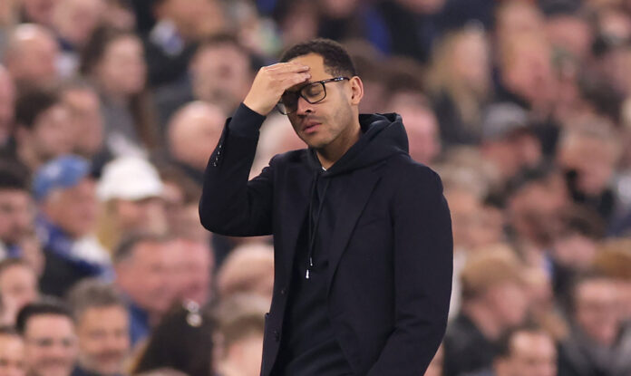 Chelsea manager Liam Rosenior reacts during the Premier League match between Everton and Chelsea at Hill Dickinson Stadium on March 21, 2026 in Liverpool, England.