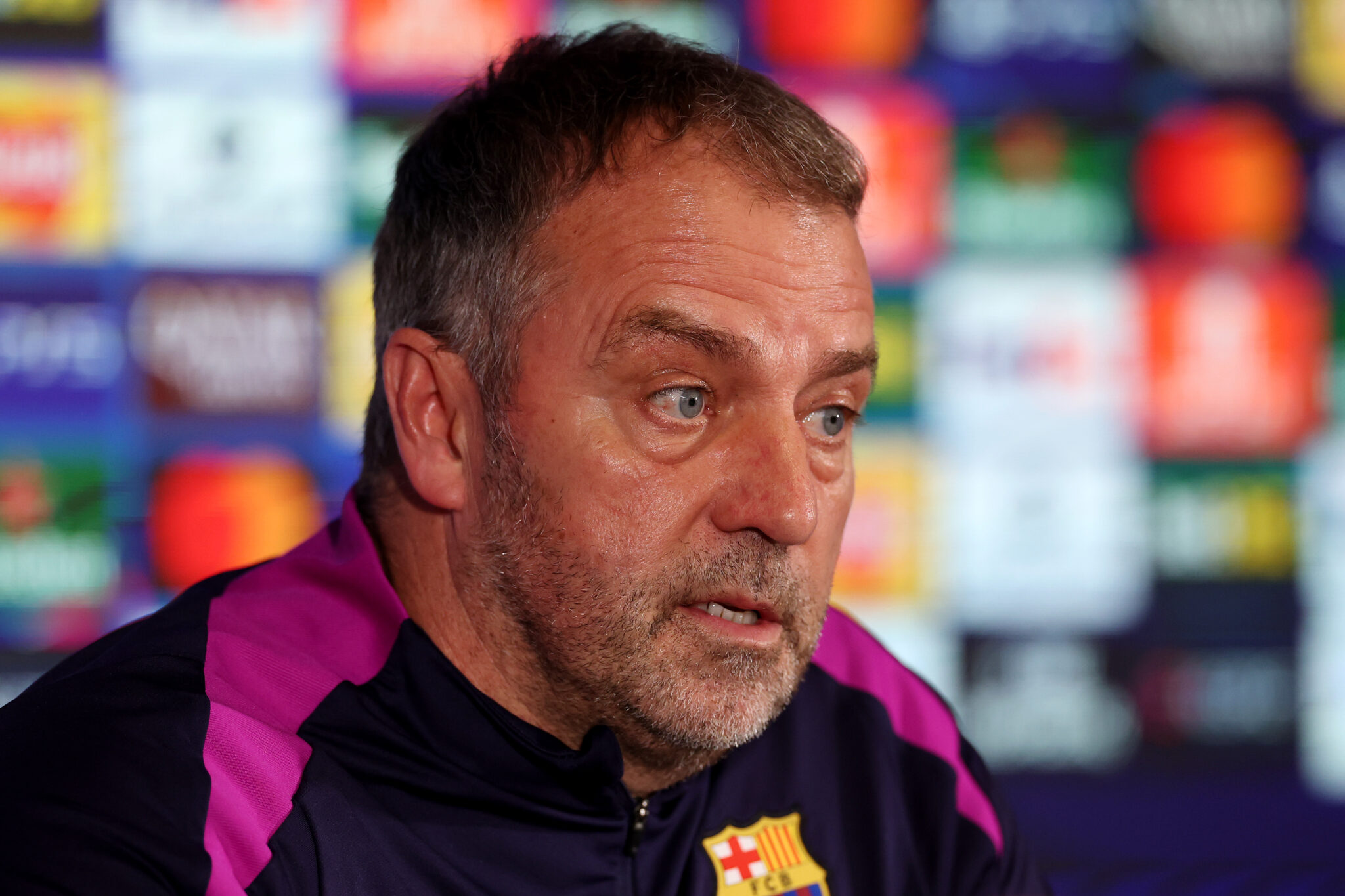 Hansi Flick, Head Coach of FC Barcelona, speaks to the media during a press conference ahead of the UEFA Champions League 2025/26 Round of 16 First Leg match between Newcastle United and FC Barcelona at St James' Park on March 09, 2026 in Newcastle upon Tyne, England.