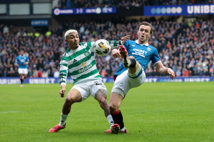 Fans clash on Ibrox pitch as Celtic beat Rangers
