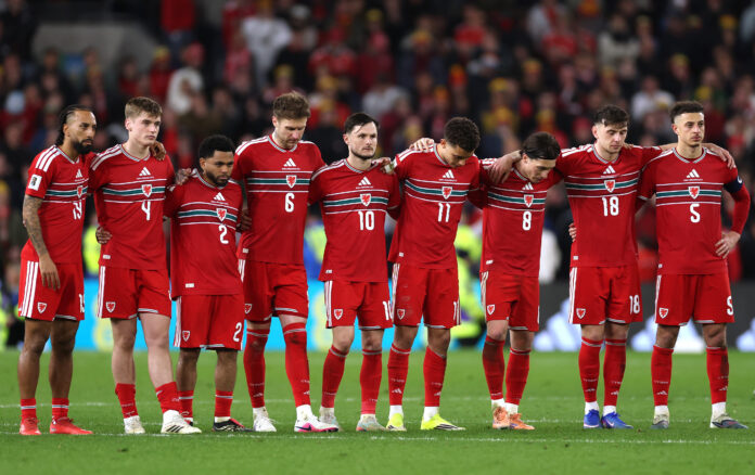 The Wales national team looks on after losing in a penalty shootout after the FIFA World Cup 2026 European Qualifiers KO play-off match between Wales and Bosnia and Herzegovina at Cardiff City Stadium on March 26, 2026 in Cardiff, Wales.