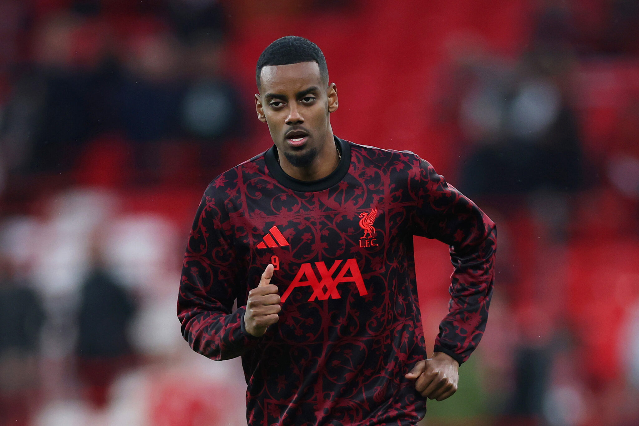 Liverpool boss Slot urges patience with Isak return