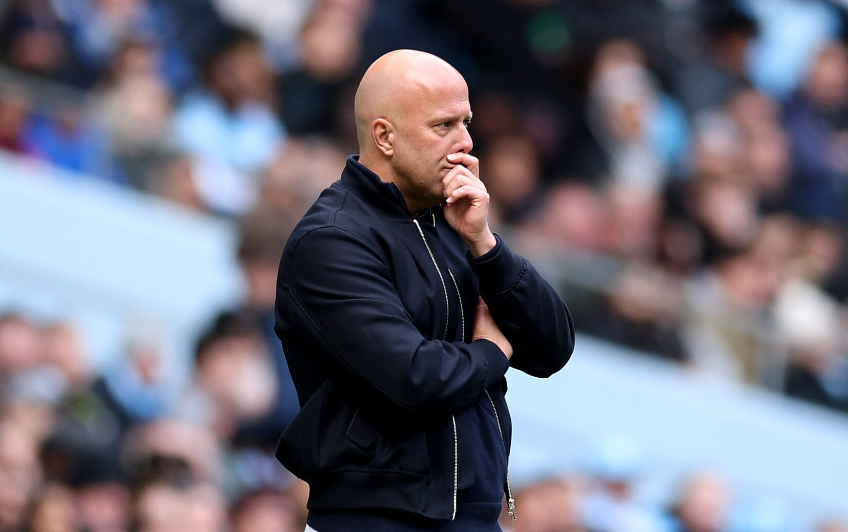 Arne Slot, Manager of Liverpool, looks dejected during the Emirates FA Cup Quarter Final match between Manchester City and Liverpool at Etihad Stadium on April 04, 2026 in Manchester, England.