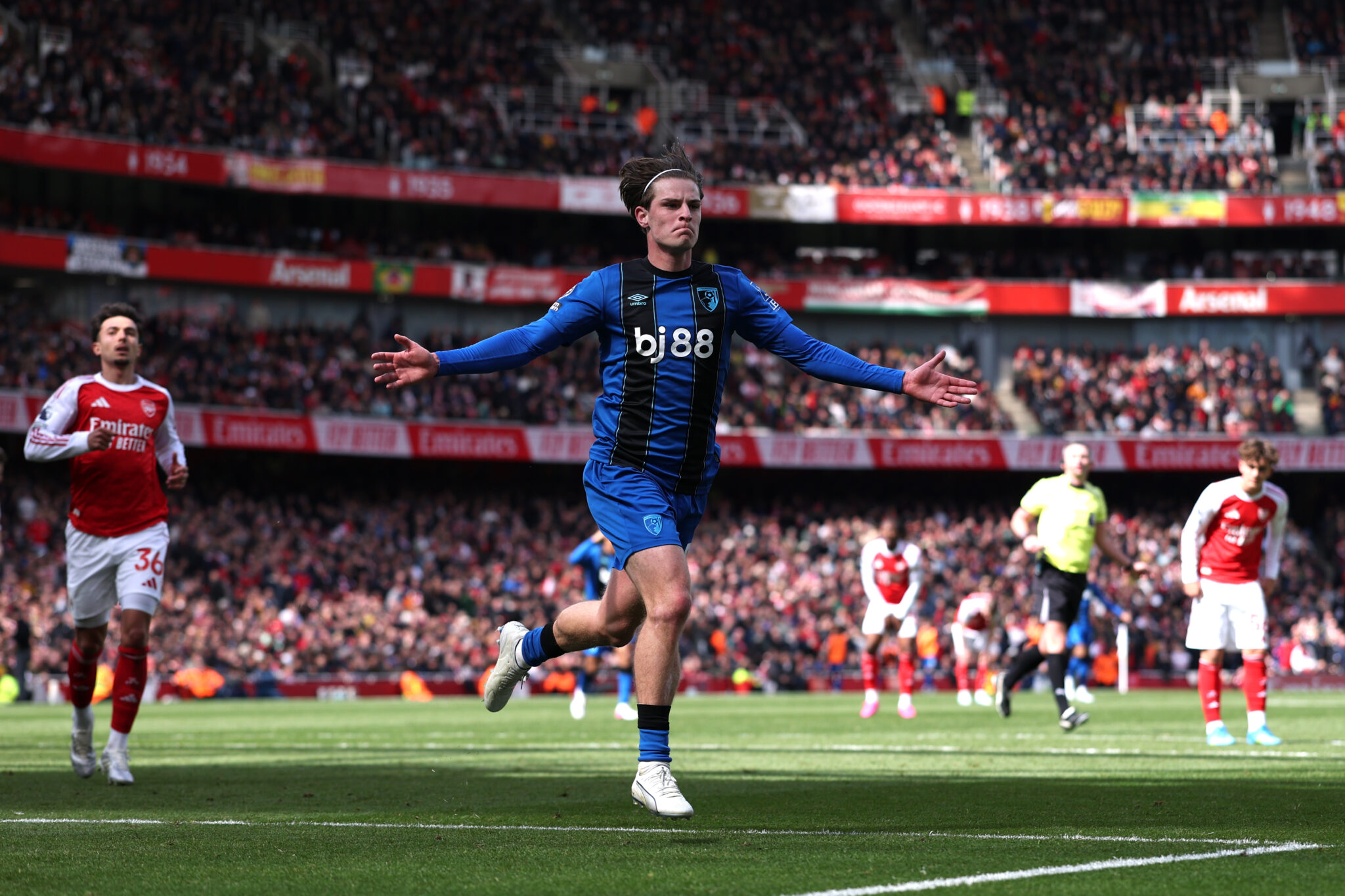 Bournemouth player Alex Scott celebrates scoring his team's second goal during the Premier League match between Arsenal and Bournemouth at Emirates Stadium on April 11, 2026 in London, England.