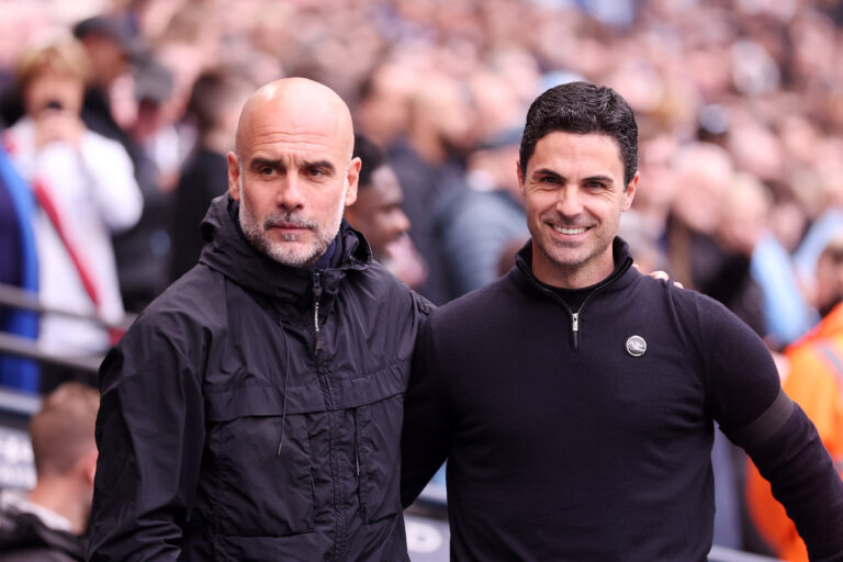 Pep Guardiola, Manager of Man City, and Mikel Arteta, Manager of Arsenal, interact prior to the Premier League match between Manchester City and Arsenal at Etihad Stadium on April 19, 2026 in Manchester, England.