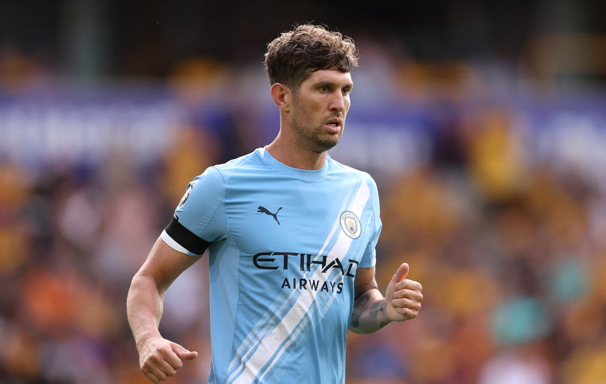 John Stones of Manchester City during the Premier League match between Wolverhampton Wanderers and Manchester City at Molineux on August 16, 2025 in Wolverhampton, England.