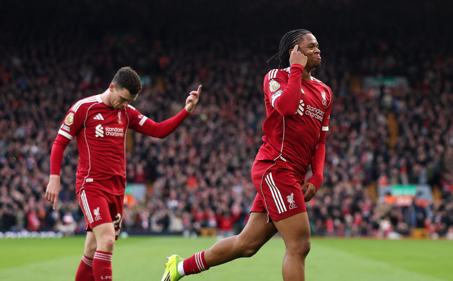 Rio Ngumoha of Liverpool celebrates scoring his team's first goal during the Premier League match between Liverpool and Fulham at Anfield on April 11, 2026 in Liverpool, England.