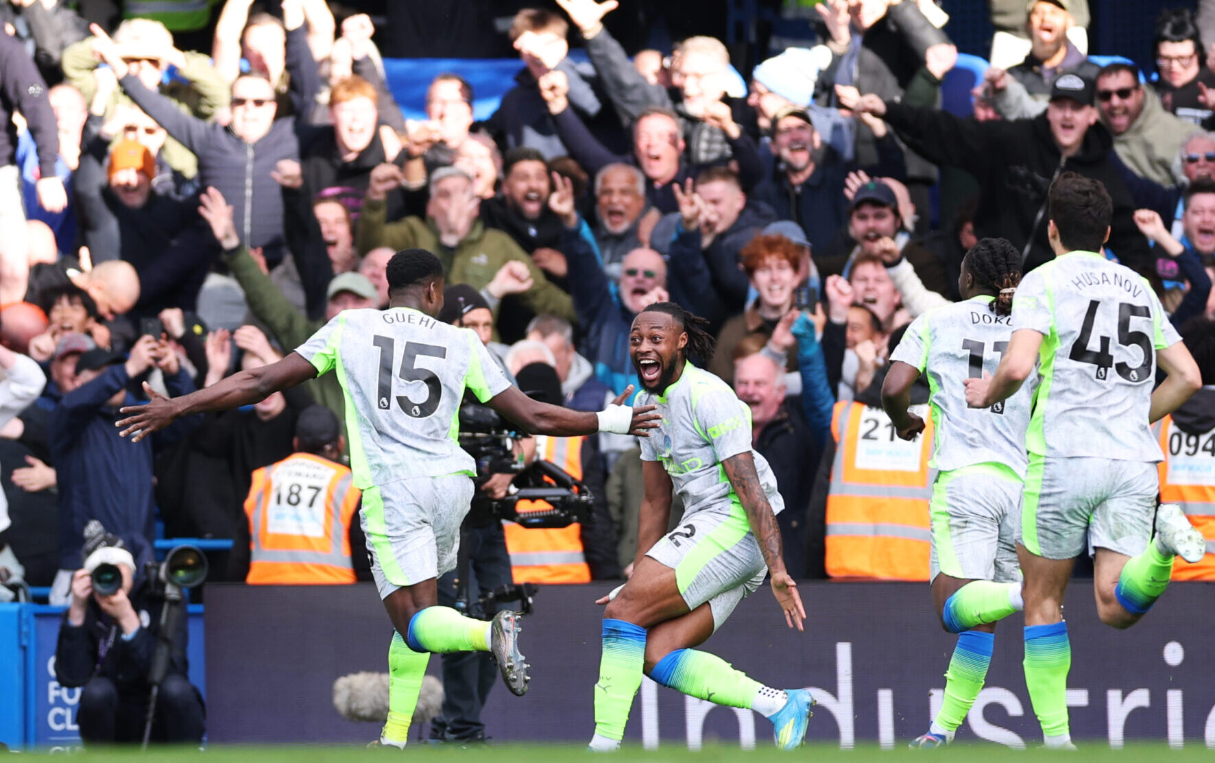 Man City player Marc Guehi of Manchester City celebrates scoring his team's second goal with Antoine Semenyo during the Premier League match between Chelsea and Manchester City at Stamford Bridge on April 12, 2026 in London, England.