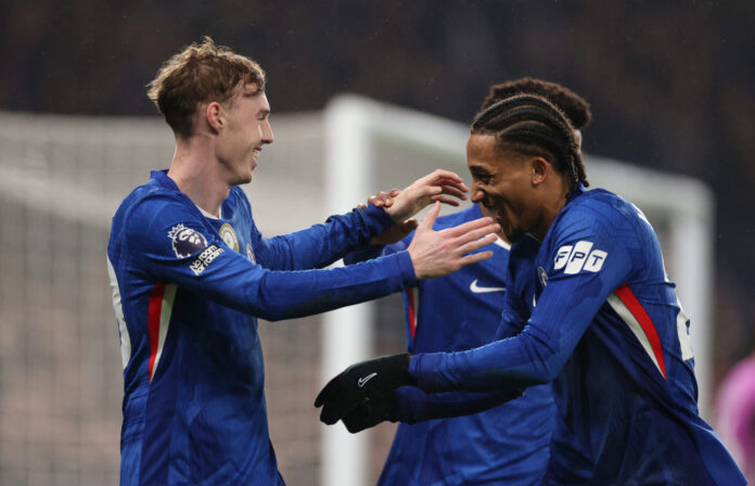 Cole Palmer of Chelsea celebrates scoring his team's second goal from the penalty spot with teammate Joao Pedro during the Premier League match between Chelsea and Leeds United at Stamford Bridge on February 10, 2026 in London, England.