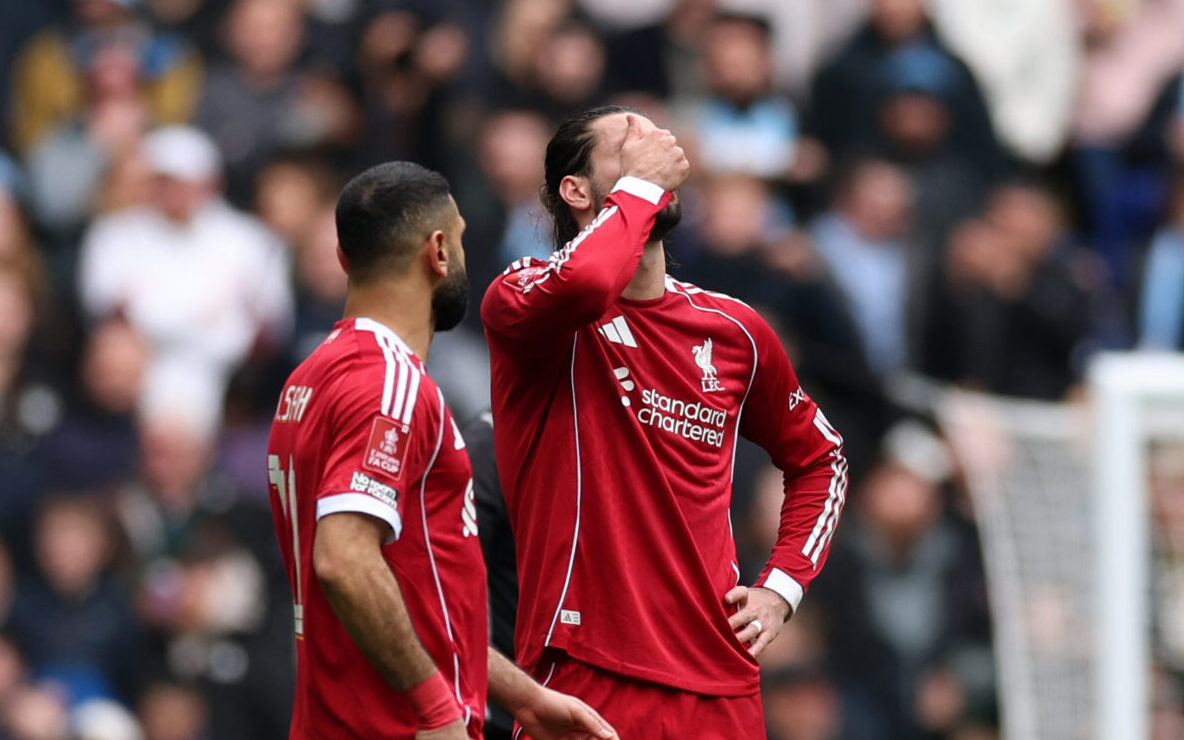 Mo Salah and Dominik Szoboszlai of Liverpool react after conceding the third goal, scored by Antoine Semenyo of Manchester City during the Emirates FA Cup Quarter Final match between Manchester City and Liverpool at Etihad Stadium on April 04, 2026 in Manchester, England.
