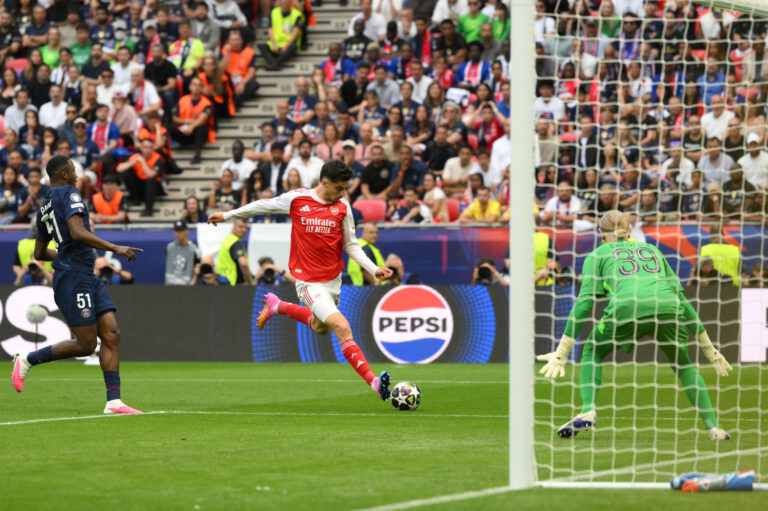 Arsenal player Kai Havertz scores his team's first goal during the UEFA Champions League Final 2026 match between Paris Saint-Germain and Arsenal FC at Puskas Arena on May 30, 2026 in Budapest, Hungary.