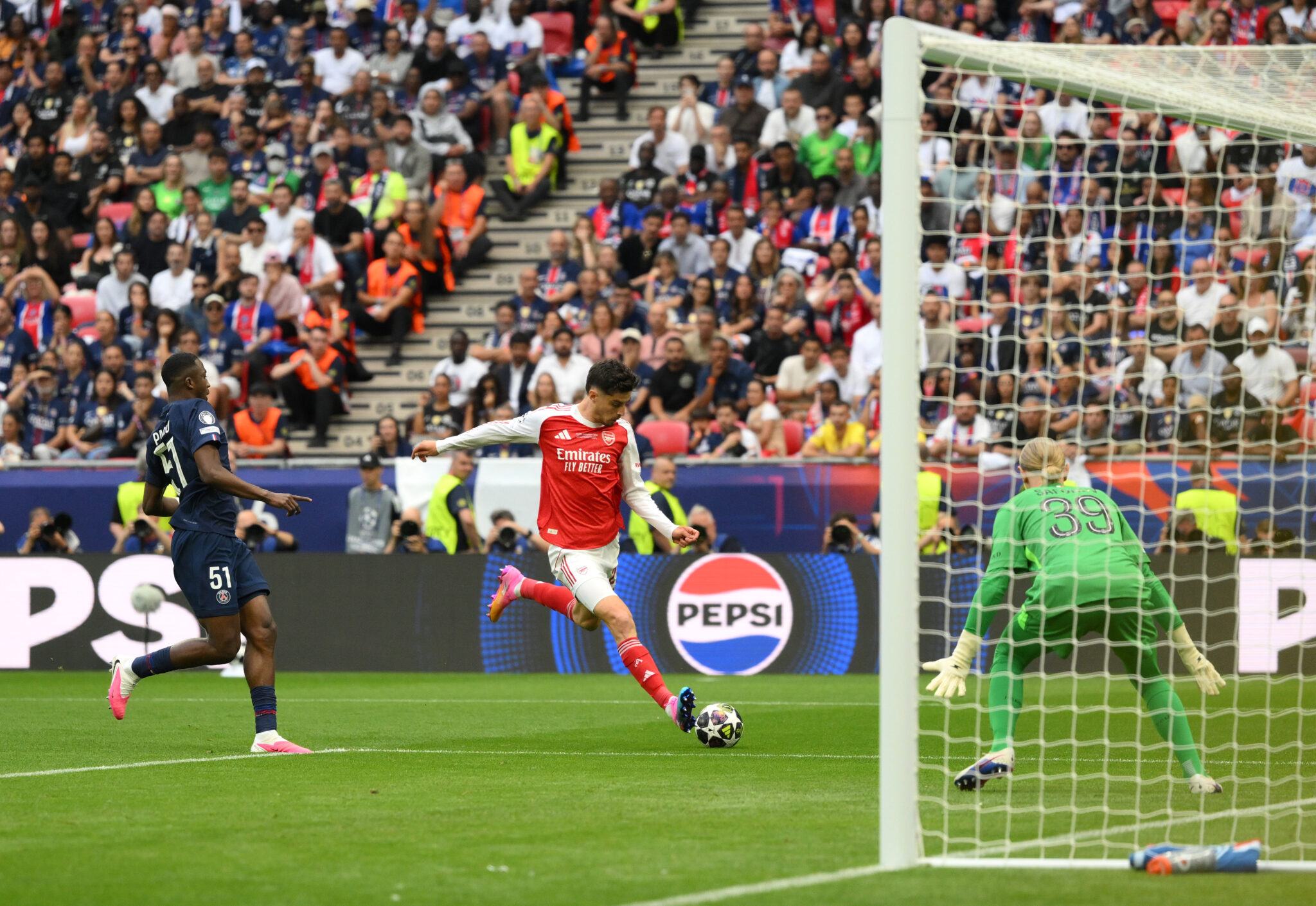 Arsenal player Kai Havertz scores his team's first goal during the UEFA Champions League Final 2026 match between Paris Saint-Germain and Arsenal FC at Puskas Arena on May 30, 2026 in Budapest, Hungary.