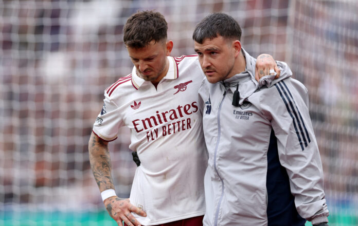 Arsenal player Ben White leaves the pitch after picking up an injury during the Premier League match between West Ham United and Arsenal at London Stadium on May 10, 2026 in London, England.