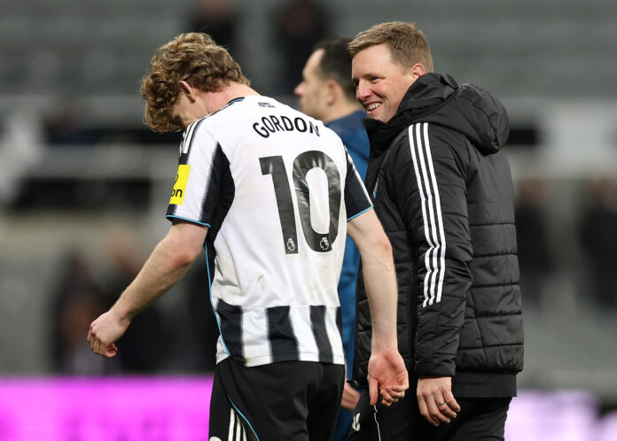 Eddie Howe, Manager of Newcastle United, celebrates victory with Anthony Gordon following the Premier League match between Newcastle United and Manchester United at St James' Park on March 04, 2026 in Newcastle upon Tyne, England.