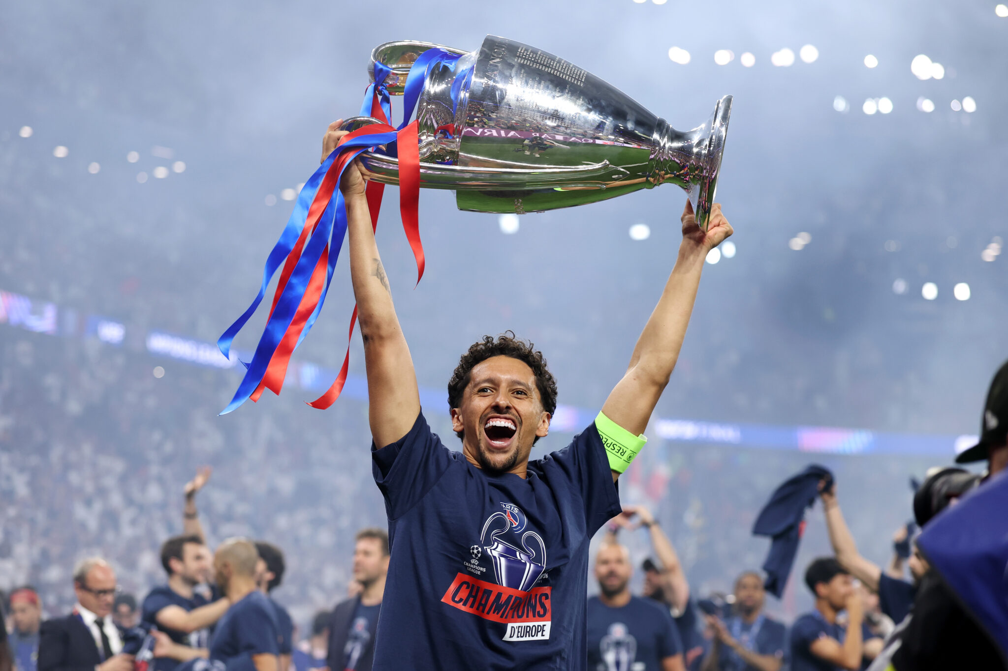 PSG captain Marquinhos celebrates the team's victory while holding the UEFA Champions League trophy after the UEFA Champions League Final 2026 match between Paris Saint-Germain and Arsenal FC at Puskas Arena on May 30, 2026 in Budapest, Hungary.