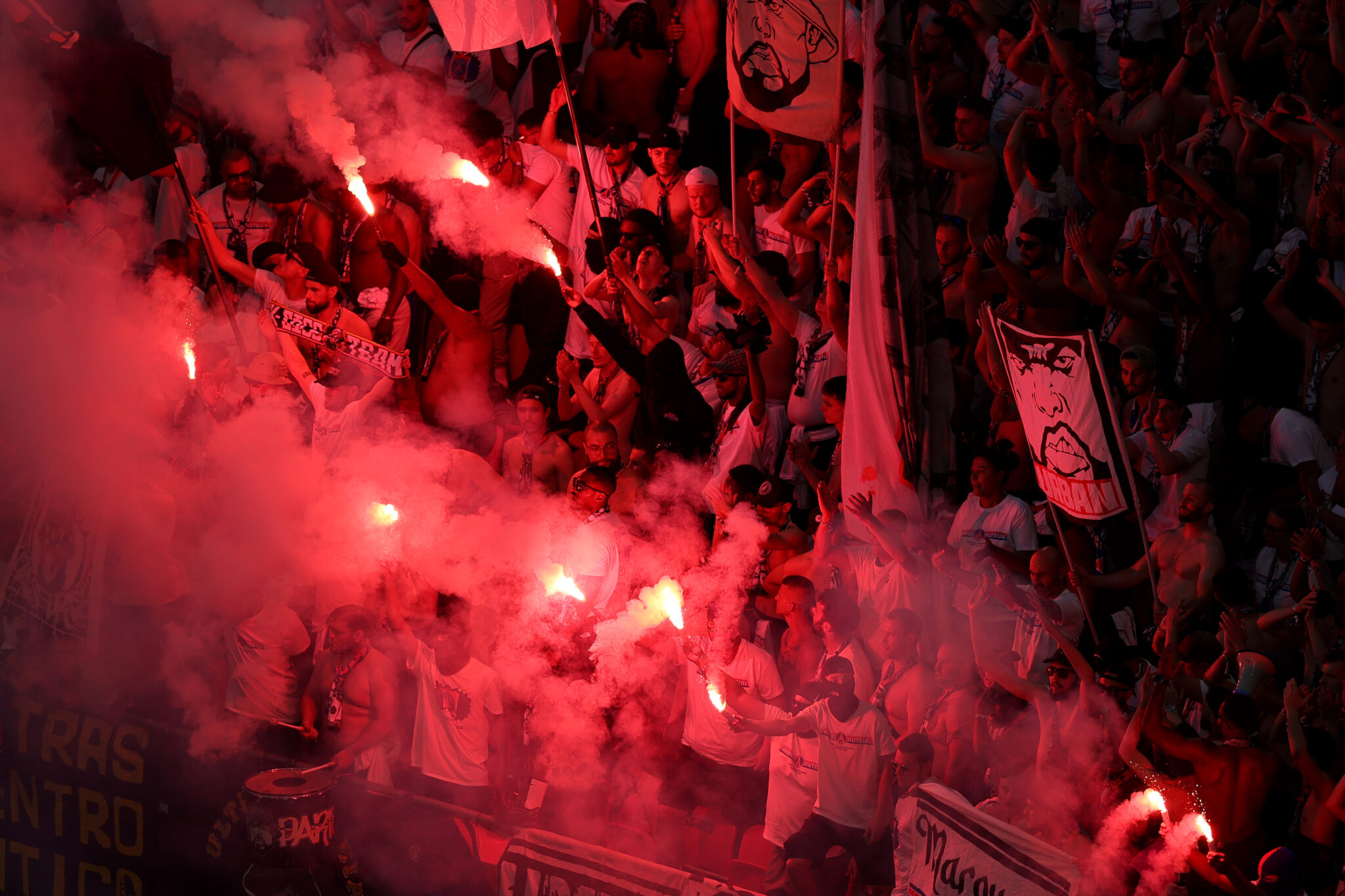 PSG fans set off red flares in the stands during the UEFA Champions League Final 2026 match between Paris Saint-Germain and Arsenal FC at Puskas Arena on May 30, 2026 in Budapest, Hungary.