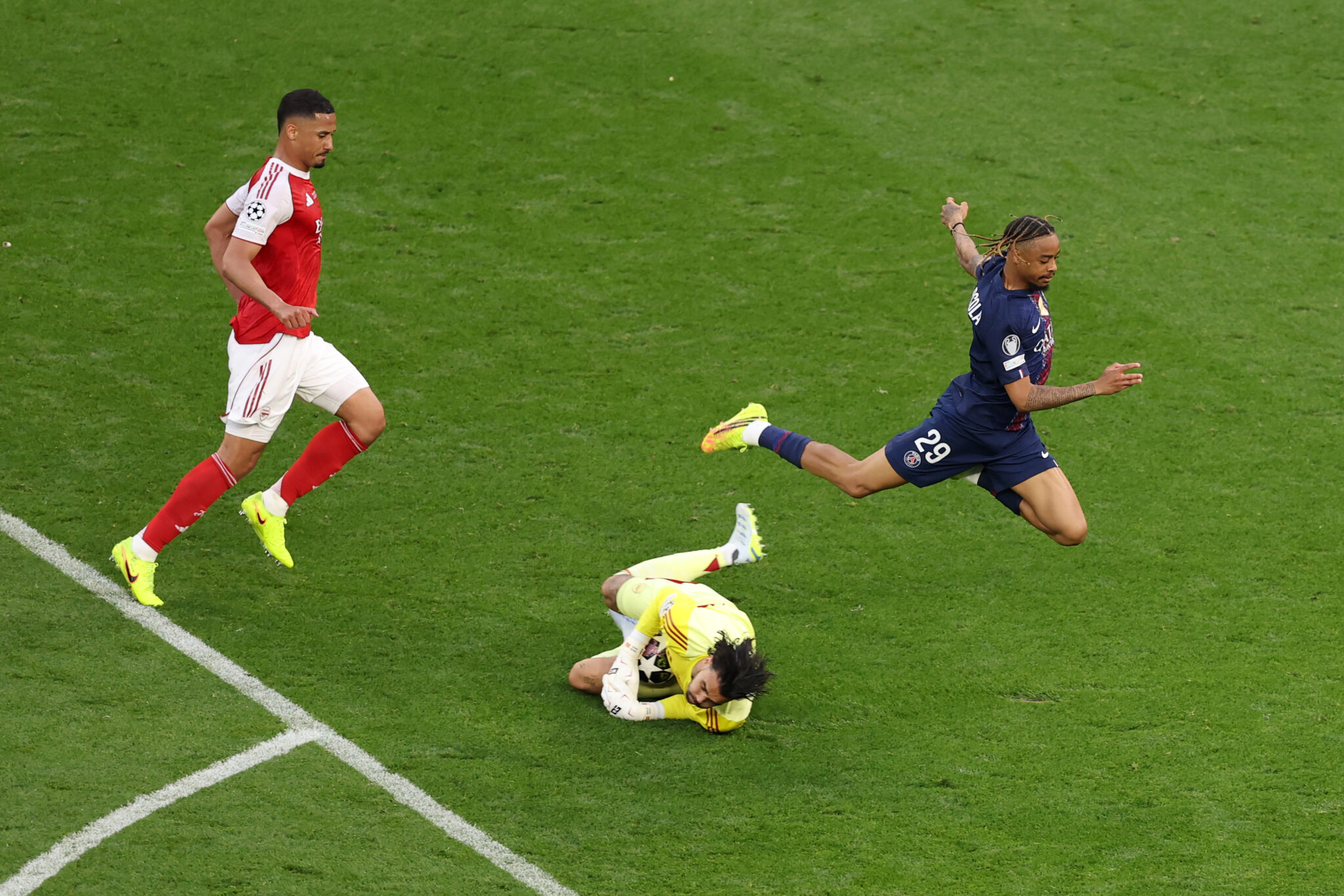 David Raya of Arsenal makes a save against Bradley Barcola of Paris Saint-Germain during the UEFA Champions League Final 2026 match between Paris Saint-Germain and Arsenal FC at Puskas Arena on May 30, 2026 in Budapest, Hungary.