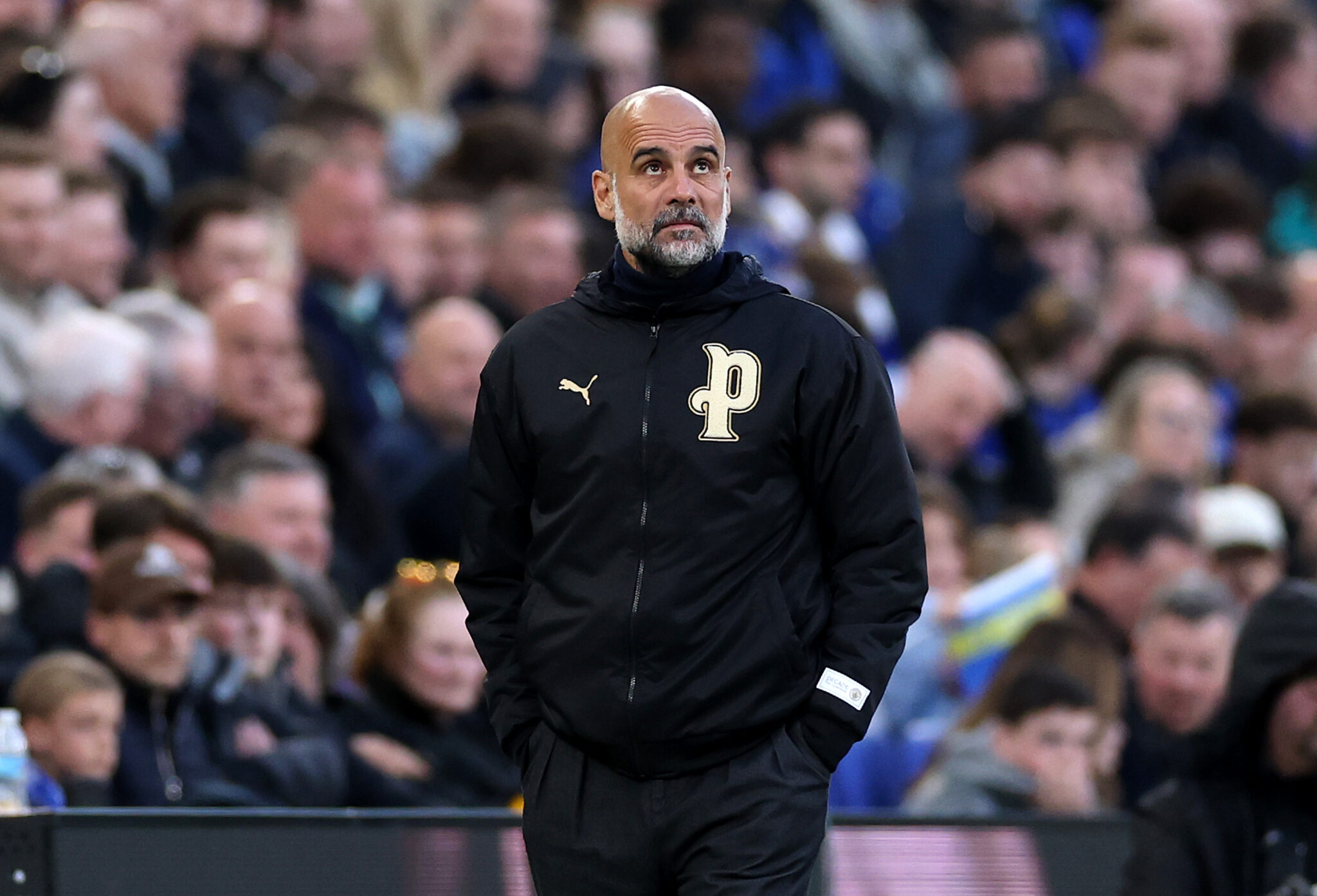 Pep Guardiola, Manager of Man City, looks on during the Premier League match between Everton and Manchester City at Hill Dickinson Stadium on May 04, 2026 in Liverpool, England.