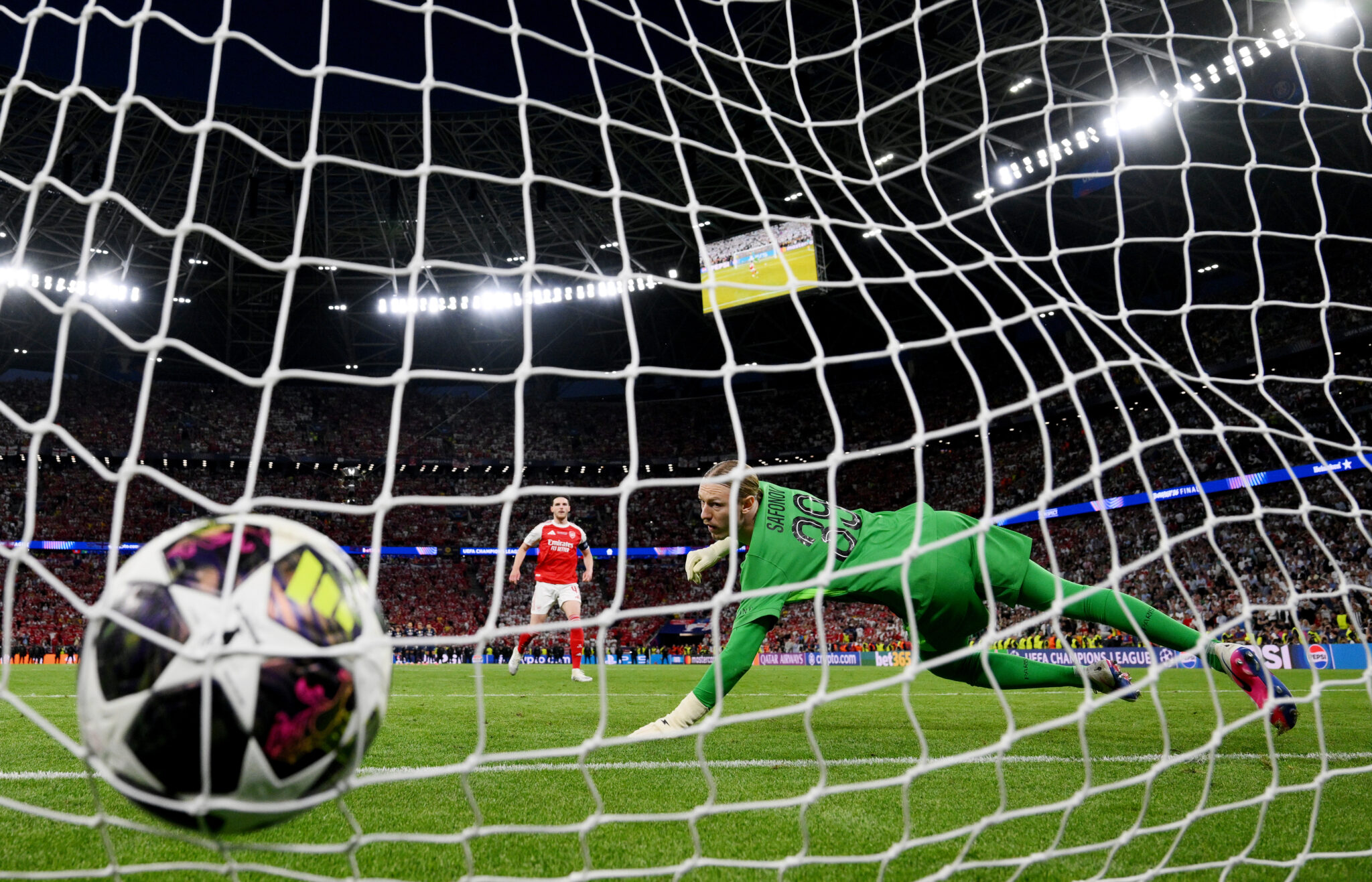 Declan Rice of Arsenal scores the team's third penalty in the penalty shoot out as Matvey Safonov of PSG fails to make a save during the UEFA Champions League Final 2026 match between Paris Saint-Germain and Arsenal FC at Puskas Arena on May 30, 2026 in Budapest, Hungary.