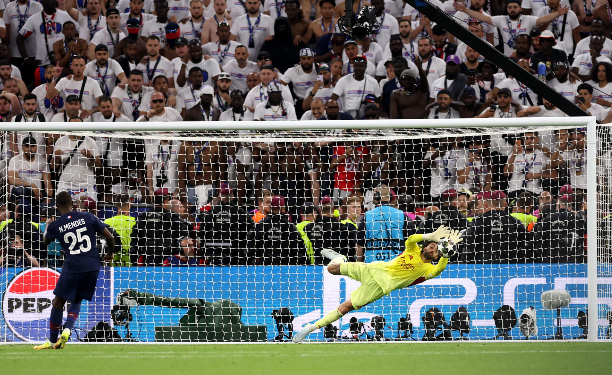 David Raya of Arsenal saves the third penalty from Nuno Mendes of PSG in the penalty shoot out during the UEFA Champions League Final 2026 match between Paris Saint-Germain and Arsenal FC at Puskas Arena on May 30, 2026 in Budapest, Hungary.
