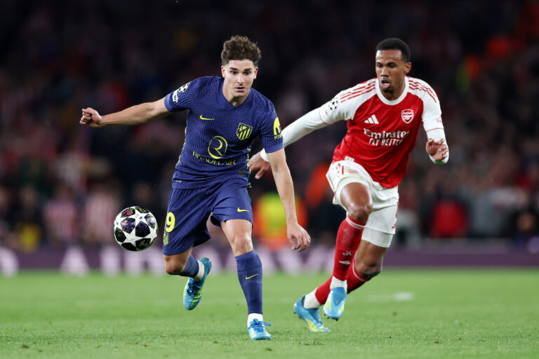 Julian Alvarez of Atletico de Madrid looks to control the ball while under pressure from Gabriel of Arsenal during the UEFA Champions League 2025/26 Semi Final Second Leg match between Arsenal FC and Atletico de Madrid at Arsenal Stadium on May 05, 2026 in London, England.