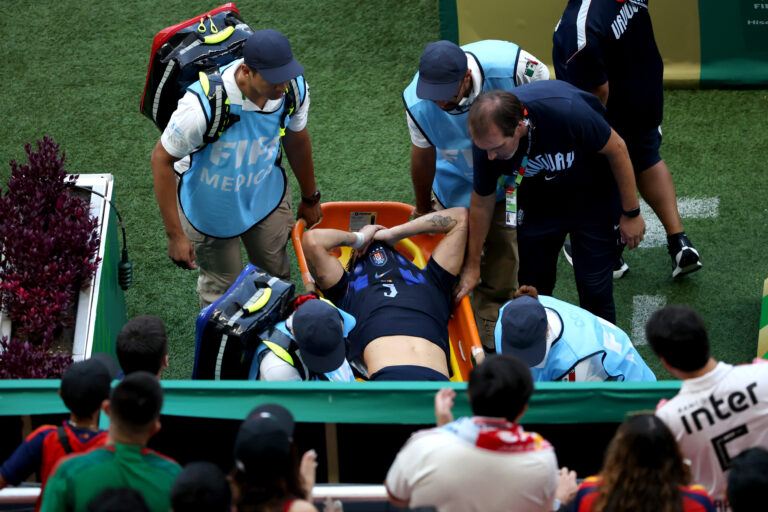 Man United player Manuel Ugarte #5 of Uruguay is stretched off after an injury during the FIFA World Cup 2026 Group H match between Uruguay and Spain at Guadalajara Stadium on June 26, 2026 in Zapopan, Mexico.