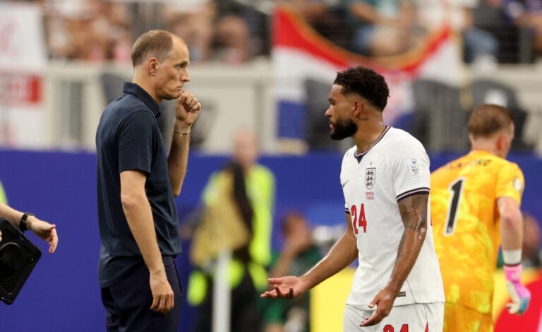 Thomas Tuchel, Manager of England, speaks with Reece James #24 during the FIFA World Cup 2026 Group L match between England and Croatia at Dallas Stadium on June 17, 2026 in Arlington, Texas.