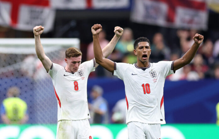 Elliot Anderson #8 and Jude Bellingham #10 of England celebrate the team's 2-1 victory in the FIFA World Cup 2026 Round Of 32 match between England and Congo DR at Atlanta Stadium on July 01, 2026 in Atlanta, Georgia.