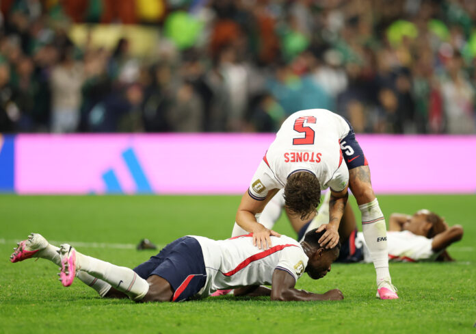 Marc Guehi #6 and John Stones #5 of England celebrate after the team's 3-2 victory during the FIFA World Cup 2026 Round of 16 match between Mexico and England at Mexico City Stadium on July 05, 2026 in Mexico City, Mexico.