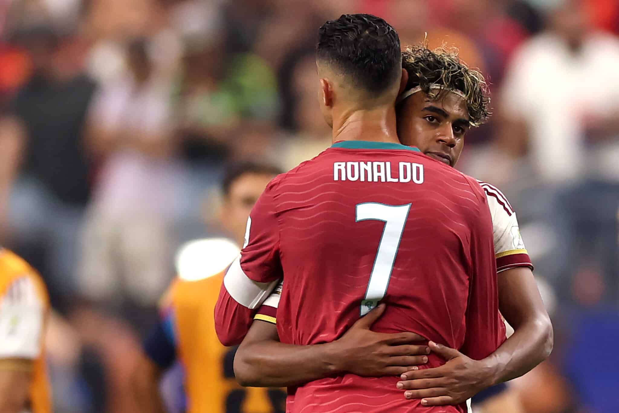 Cristiano Ronaldo #7 of Portugal congratulates Lamine Yamal #19 of Spain on the 1-0 victory during the FIFA World Cup 2026 Round of 16 match between Portugal and Spain at Dallas Stadium on July 06, 2026 in Arlington, Texas.