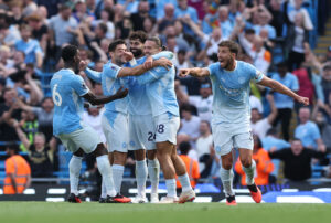 Man City come back late to snatch win over Bournemouth